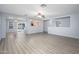 Spacious living room with contemporary flooring, offering an open and airy atmosphere for relaxation and entertainment at 11501 W Charter Oak Rd, El Mirage, AZ 85335