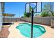 Backyard pool and basketball hoop at 11501 W Charter Oak Rd, El Mirage, AZ 85335