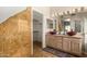 Beautiful bathroom with double sinks, ample lighting, tile floors and walk in closet at 1631 E Carla Vista Dr, Chandler, AZ 85225