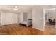Bedroom featuring wood floors, large closet and ceiling fan at 1631 E Carla Vista Dr, Chandler, AZ 85225