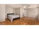 Bedroom featuring wood floors, neutral paint and a ceiling fan at 1631 E Carla Vista Dr, Chandler, AZ 85225