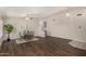 Sunlit dining room features wood floors and a stylish table with seating for four at 1631 E Carla Vista Dr, Chandler, AZ 85225