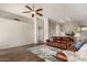 Open concept living room offers wood floors, high ceilings and lots of natural light at 1631 E Carla Vista Dr, Chandler, AZ 85225