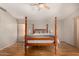 Bright main bedroom featuring wood floors, neutral paint and a ceiling fan at 1631 E Carla Vista Dr, Chandler, AZ 85225