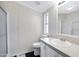 Bright bathroom featuring a shower, toilet, vanity, and clean white walls at 201 S Greenfield Rd # 51, Mesa, AZ 85206