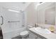 Well-lit bathroom with a tub, shower, toilet, vanity, and a large mirror at 201 S Greenfield Rd # 51, Mesa, AZ 85206