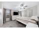 Comfortable bedroom featuring a ceiling fan, dresser and ample natural light at 201 S Greenfield Rd # 51, Mesa, AZ 85206
