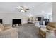 Spacious living room with open floor plan, comfortable seating and kitchen view at 201 S Greenfield Rd # 51, Mesa, AZ 85206