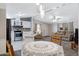 Open concept living room with kitchen and dining area at 201 S Greenfield Rd # 51, Mesa, AZ 85206