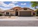 Charming single-story home with a well-manicured desert landscape at 4529 E Thistle Landing Dr, Phoenix, AZ 85044