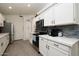 Modern kitchen featuring white cabinets, stainless appliances and sleek countertops at 4529 E Thistle Landing Dr, Phoenix, AZ 85044