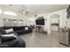 Spacious living room with high ceilings, neutral decor and hardwood flooring at 4529 E Thistle Landing Dr, Phoenix, AZ 85044