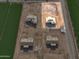 Aerial shot of a new home construction site with a framed house and rural backdrop at 5905 S 182Nd Ave, Goodyear, AZ 85338