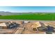 New home construction featuring a view of the open landscape and neighboring properties in development at 5905 S 182Nd Ave, Goodyear, AZ 85338