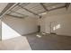 Spacious garage with high ceilings and ample space for parking at 669 E Scenic St, Apache Junction, AZ 85119
