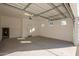 Spacious garage with high ceilings and ample space for parking at 669 E Scenic St, Apache Junction, AZ 85119
