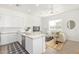 Modern kitchen featuring granite countertops, stainless steel appliances, and seamless flow into the living area at 669 E Scenic St, Apache Junction, AZ 85119