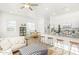 Spacious open-concept living area with seamless flow between the kitchen, dining, and living spaces at 669 E Scenic St, Apache Junction, AZ 85119