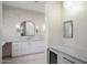Bright bathroom with double sink vanity, stylish mirrors, and modern finishes at 6718 E Caron Dr, Paradise Valley, AZ 85253