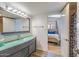 Sleek bathroom featuring a modern vanity and is adjacent to bedroom at 6718 E Caron Dr, Paradise Valley, AZ 85253