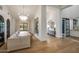 Dining room with elegant chandelier, wine storage, and stylish decor, perfect for entertaining and hosting guests at 6718 E Caron Dr, Paradise Valley, AZ 85253