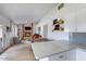 Open-concept living and kitchen space features a cozy fireplace and seamless flow at 6718 E Caron Dr, Paradise Valley, AZ 85253