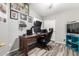 The bedroom is set up as a gaming room with luxury vinyl floors, dual monitors and recessed lighting at 9259 W Caron Cir, Peoria, AZ 85345