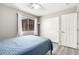 Bright bedroom features natural light, closet, and ceiling fan at 9259 W Caron Cir, Peoria, AZ 85345