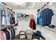 Walk-in closet with shelving and rods, ideal for storage at 9259 W Caron Cir, Peoria, AZ 85345
