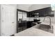 Modern kitchen features stainless steel appliances and updated countertops at 9259 W Caron Cir, Peoria, AZ 85345