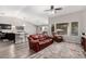 Open-concept living room with view to pool and backyard at 9259 W Caron Cir, Peoria, AZ 85345