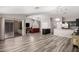 Open floorplan boasts a modern kitchen and connected living space at 9259 W Caron Cir, Peoria, AZ 85345