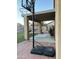 Outdoor patio with basketball hoop overlooking backyard with an in-ground pool, ideal for outdoor recreation at 9646 N 94Th Ave, Peoria, AZ 85345