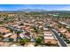 Aerial view of homes in a well-maintained neighborhood with lush trees and blue swimming pools at 12745 W Monte Vista Rd, Avondale, AZ 85392