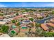 Expansive aerial view showcasing homes, swimming pools, and solar panels in a residential neighborhood at 12745 W Monte Vista Rd, Avondale, AZ 85392