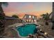 Enjoy outdoor living with a stunning backyard pool, patio and lush landscaping perfect for relaxation and entertaining at 12745 W Monte Vista Rd, Avondale, AZ 85392