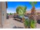 Long driveway with side yard, a truck, lush vegetation, and fencing at 12745 W Monte Vista Rd, Avondale, AZ 85392