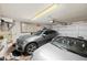 Spacious garage with ample lighting and storage space, perfect for multiple vehicles at 12745 W Monte Vista Rd, Avondale, AZ 85392