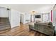 Open living area, showcasing hardwood floors, natural light, and seamless connectivity to other living spaces at 12745 W Monte Vista Rd, Avondale, AZ 85392
