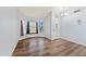 Inviting living room with beautiful wood floors, ample natural light, and neutral decor for a bright and airy feel at 12745 W Monte Vista Rd, Avondale, AZ 85392
