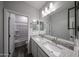 Elegant bathroom with dual sinks, granite countertops, and a convenient shower/tub combination at 2557 E Music Mountain Ave, Apache Junction, AZ 85119