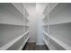 Organized walk-in closet offering an abundance of shelving for maximum storage and organization at 2557 E Music Mountain Ave, Apache Junction, AZ 85119