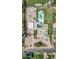 Expansive property featuring a large pool, a horse stable, ample parking, and lush greenery, ideal for comfortable living at 368 E Campbell Rd, Chandler, AZ 85225