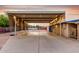 Large carport with an expansive concrete pad offering ample covered parking and storage space at 368 E Campbell Rd, Chandler, AZ 85225