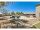 Aerial view shows the backyard with a pool, patio, and lounge area, perfect for outdoor living and entertaining at 11259 W Locust Ln, Avondale, AZ 85323