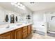 Spacious Primary bathroom with double sinks, soaking tub, and walk-in shower at 11259 W Locust Ln, Avondale, AZ 85323