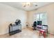 Bedroom featuring a ceiling fan and natural light streaming through the window at 11259 W Locust Ln, Avondale, AZ 85323