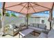 Outdoor patio with comfortable seating under a gazebo at 11259 W Locust Ln, Avondale, AZ 85323