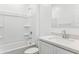 Bright bathroom with a shower-tub combo, white vanity, and toilet, offering a clean and functional space at 12246 E Agave Ln, Florence, AZ 85132