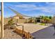 Large brick backyard with a grill, pergola, and artificial grass at 1320 E Binner Dr, Chandler, AZ 85225
